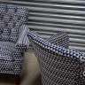 A Pair of Buttoned Back Chairs Reupholstered in Oreta Twilight, Romo Fabric