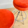 Twin Barstools Reupholstered in a Linwood Orange Velvet