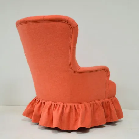 Skirted Buttonback Armchair with Curved Arms