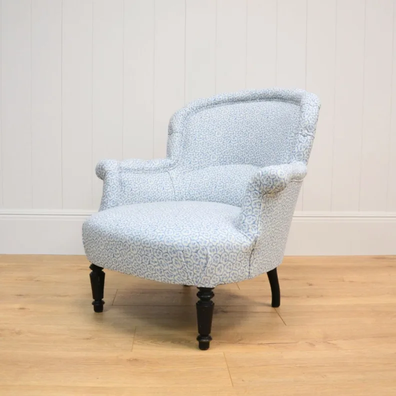 SMALL ARMCHAIR REUPHOLSTERED IN PRINTED LINEN FABRIC