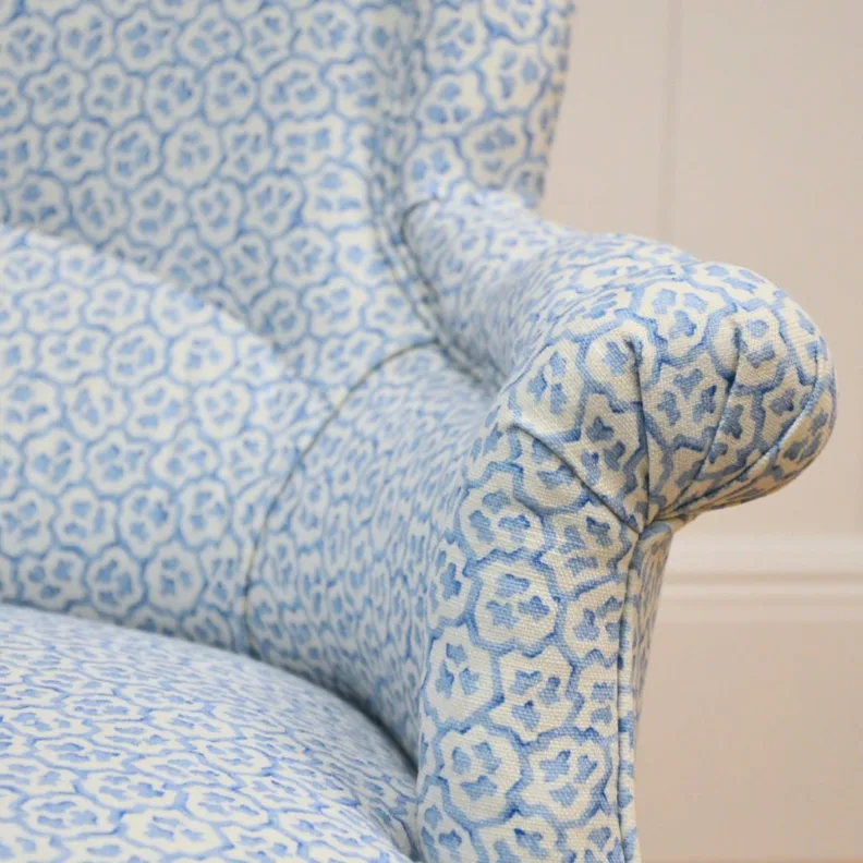 SMALL ARMCHAIR REUPHOLSTERED IN PRINTED LINEN FABRIC