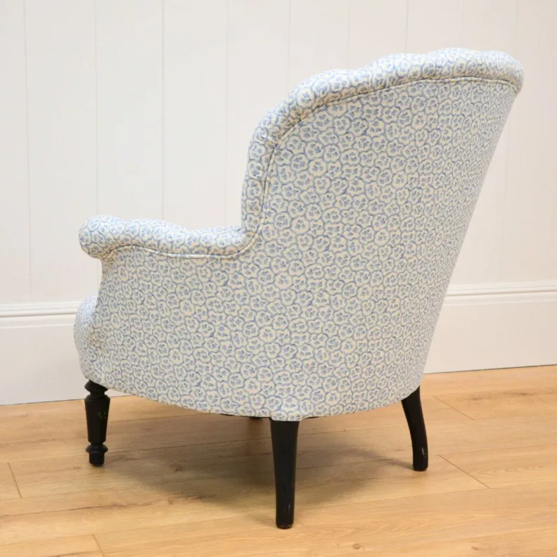 SMALL ARMCHAIR REUPHOLSTERED IN PRINTED LINEN FABRIC