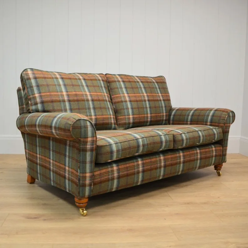 Sofa recovered in a tartan wool