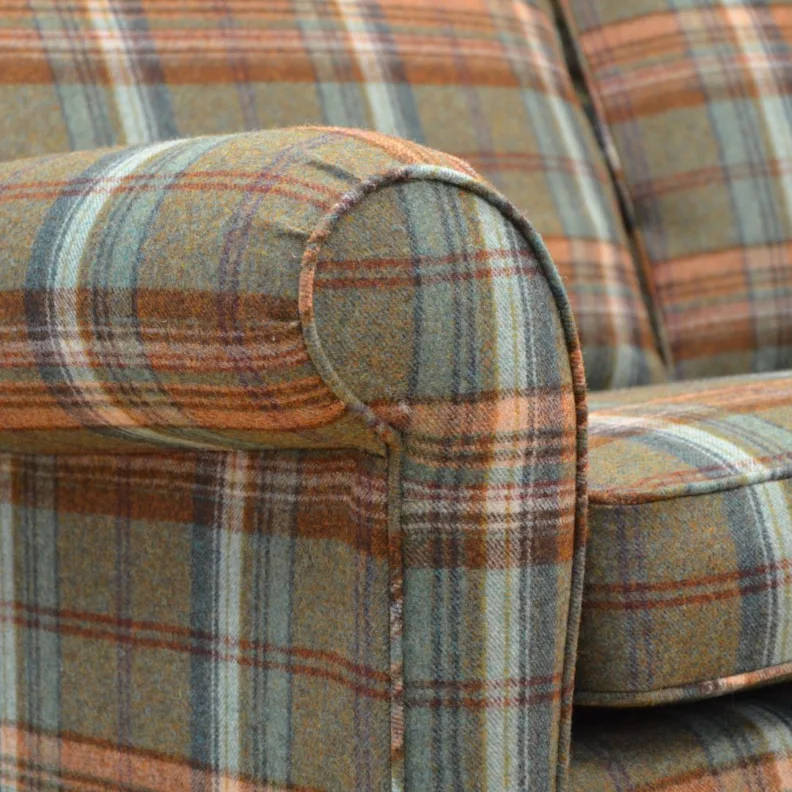 Sofa recovered in a tartan wool