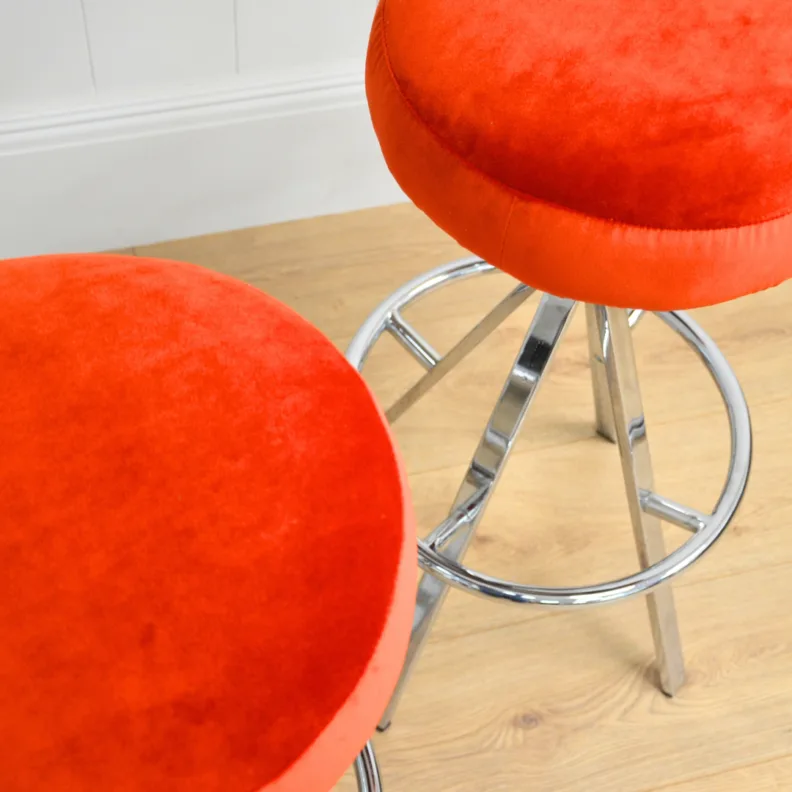 Twin Barstools Reupholstered in a Linwood Orange Velvet