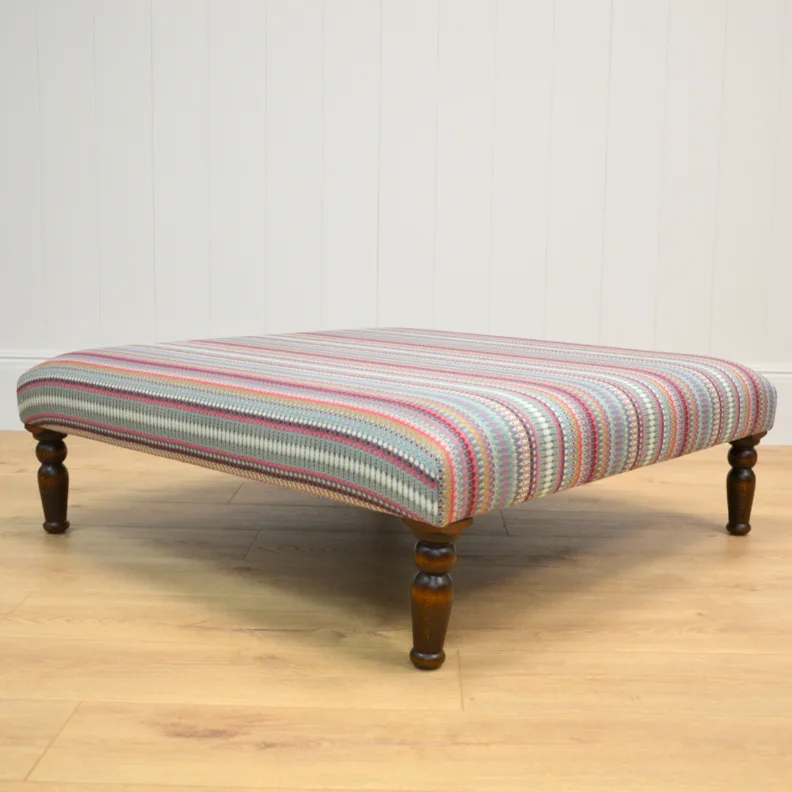 Bespoke Ottoman Covered in Multicoloured Stripe Fabric
