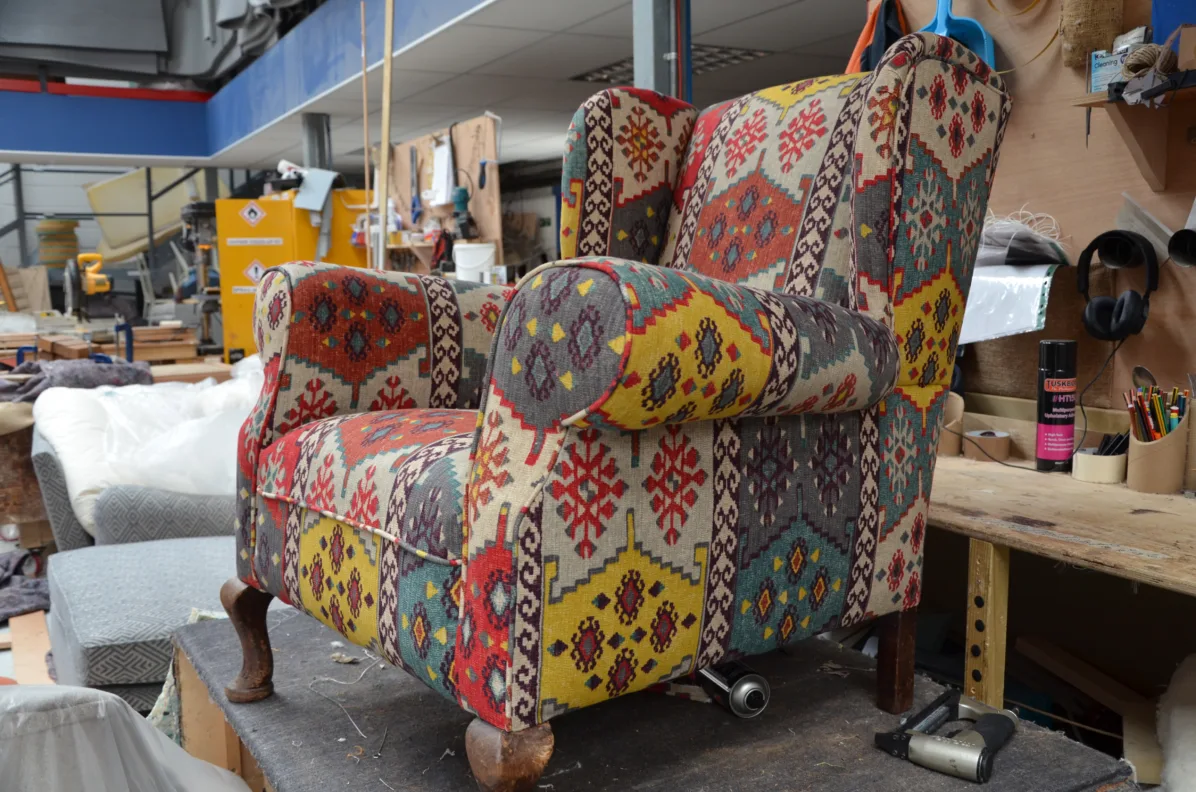 Armchair reupholstery featuring Anthropology Fabric by Warwick