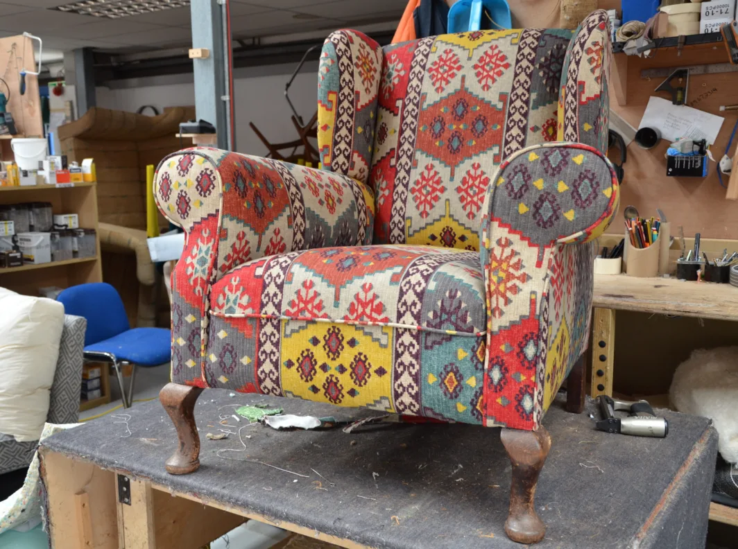 Armchair reupholstery featuring Anthropology Fabric by Warwick